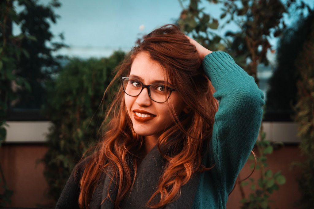 Smiling girl in glasses 